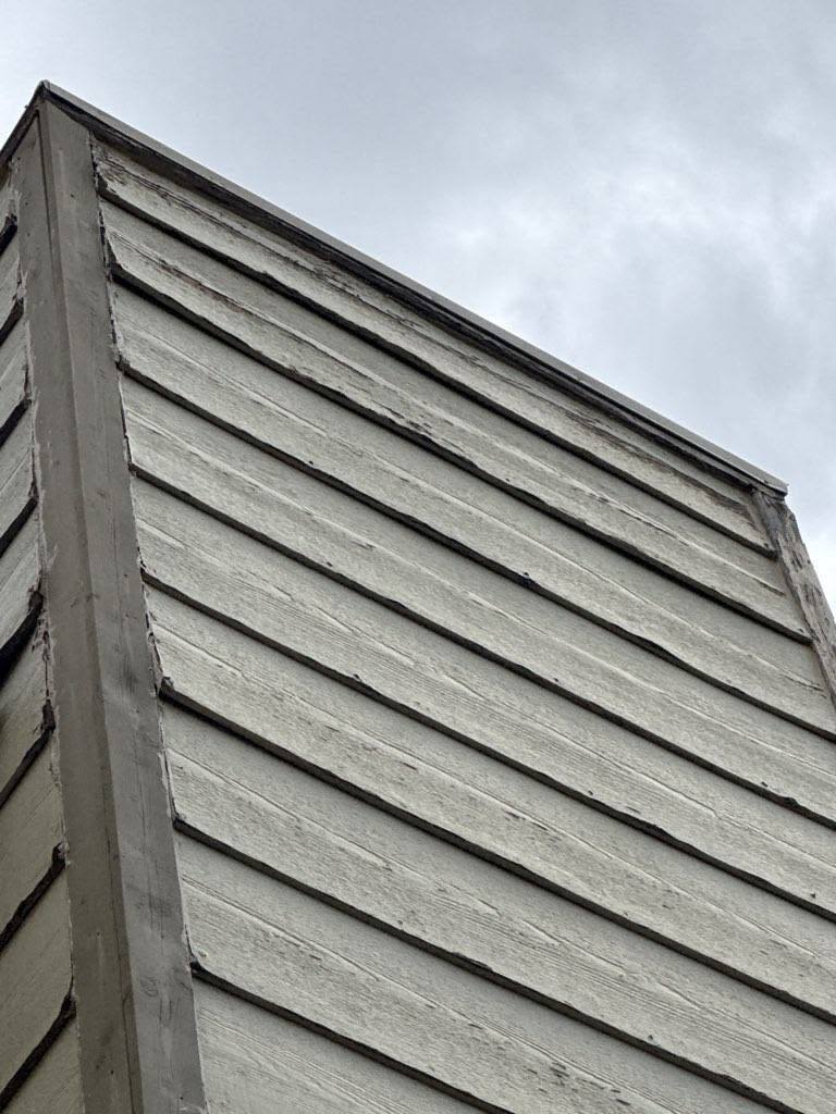 Close-up of exterior corner trim repaint