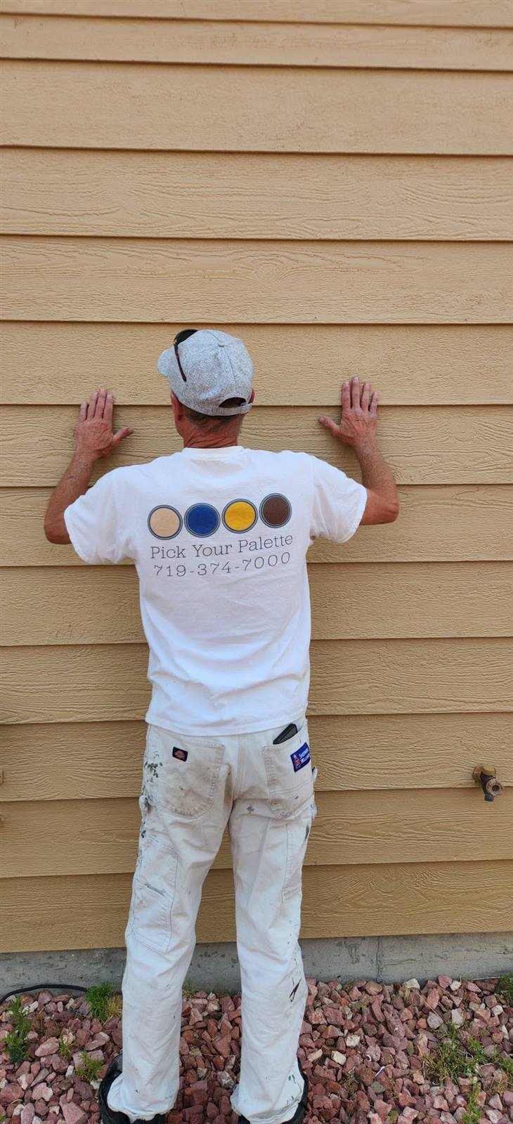 Pick Your Palette painter prepping exterior siding